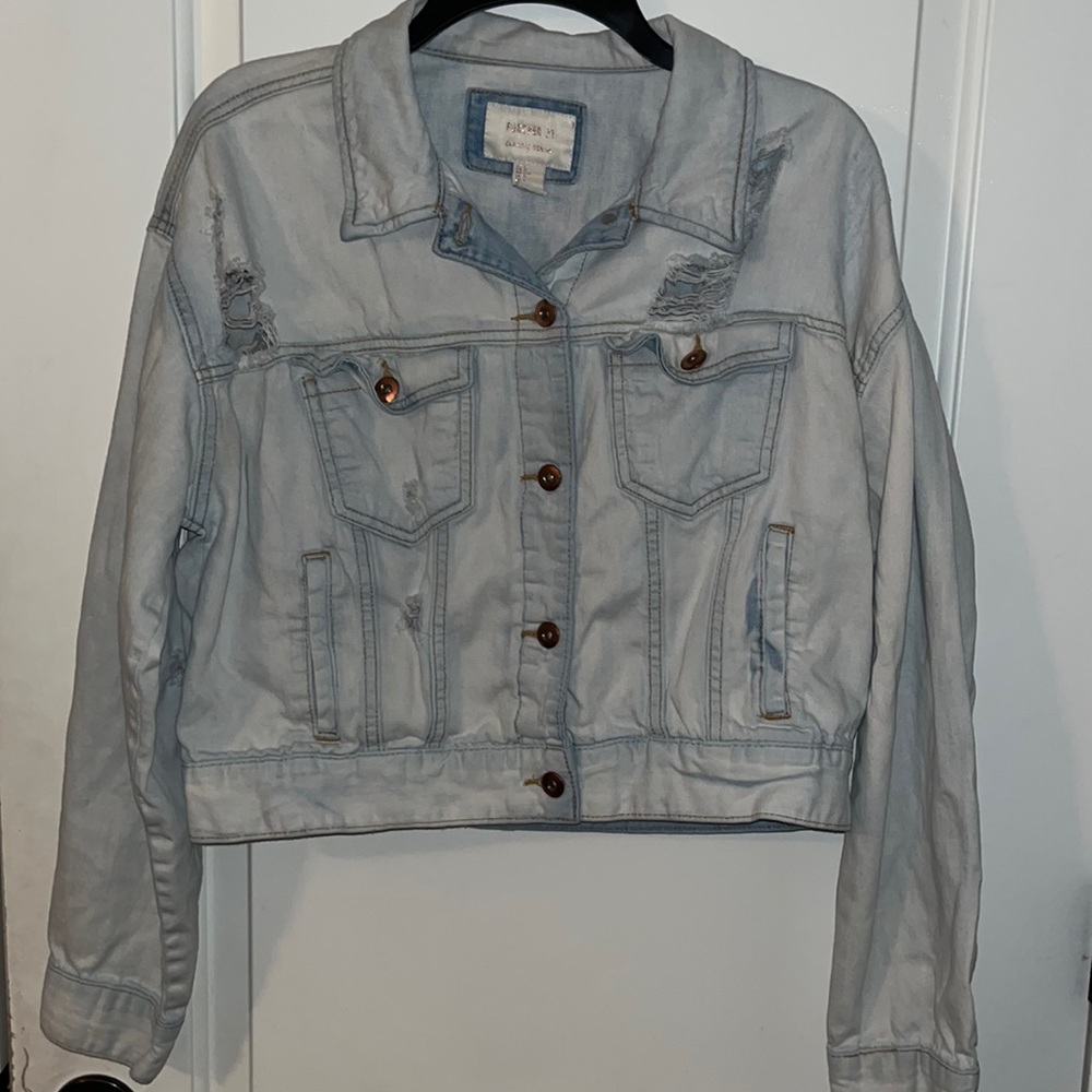 Forever 21 distressed, cropped denim jacket, size large.